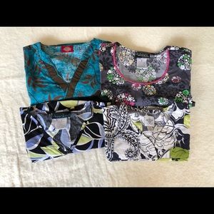 Scrub tops from four different companies